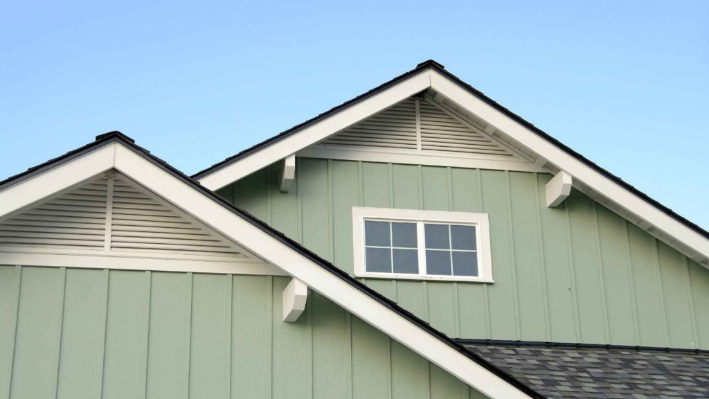 Gabled roofline with vent detailing on a weatherboard-clad home