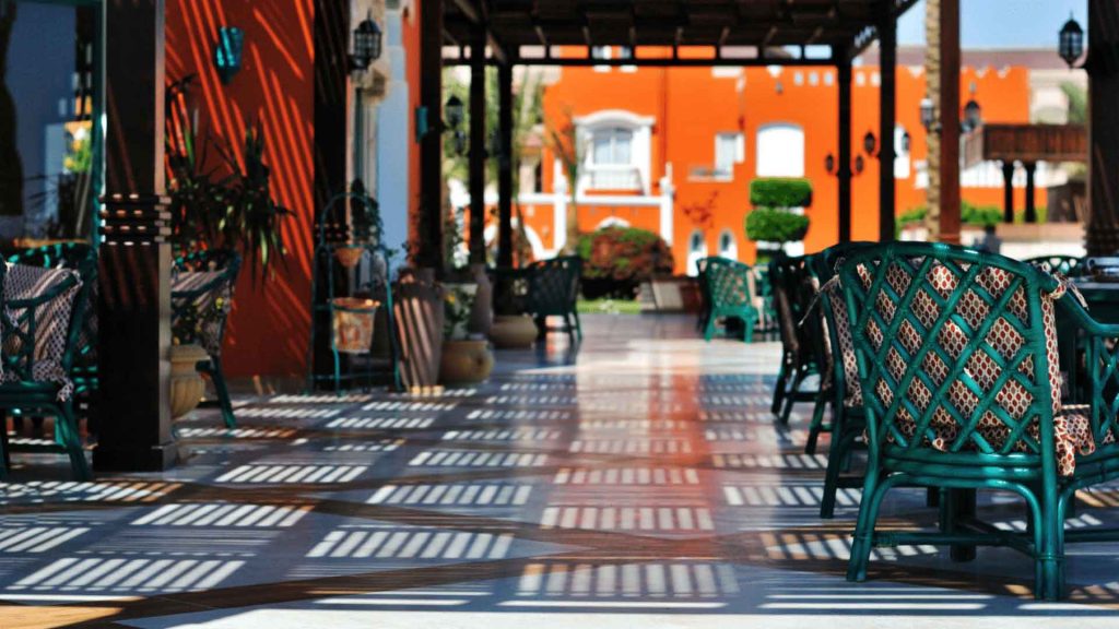 Covered outdoor seating area at a courtyard property